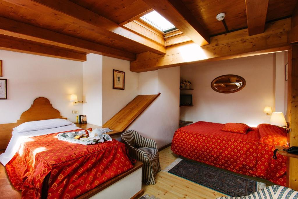Hotel Cornelio コルティーナ・ダンペッツォ 部屋 写真
